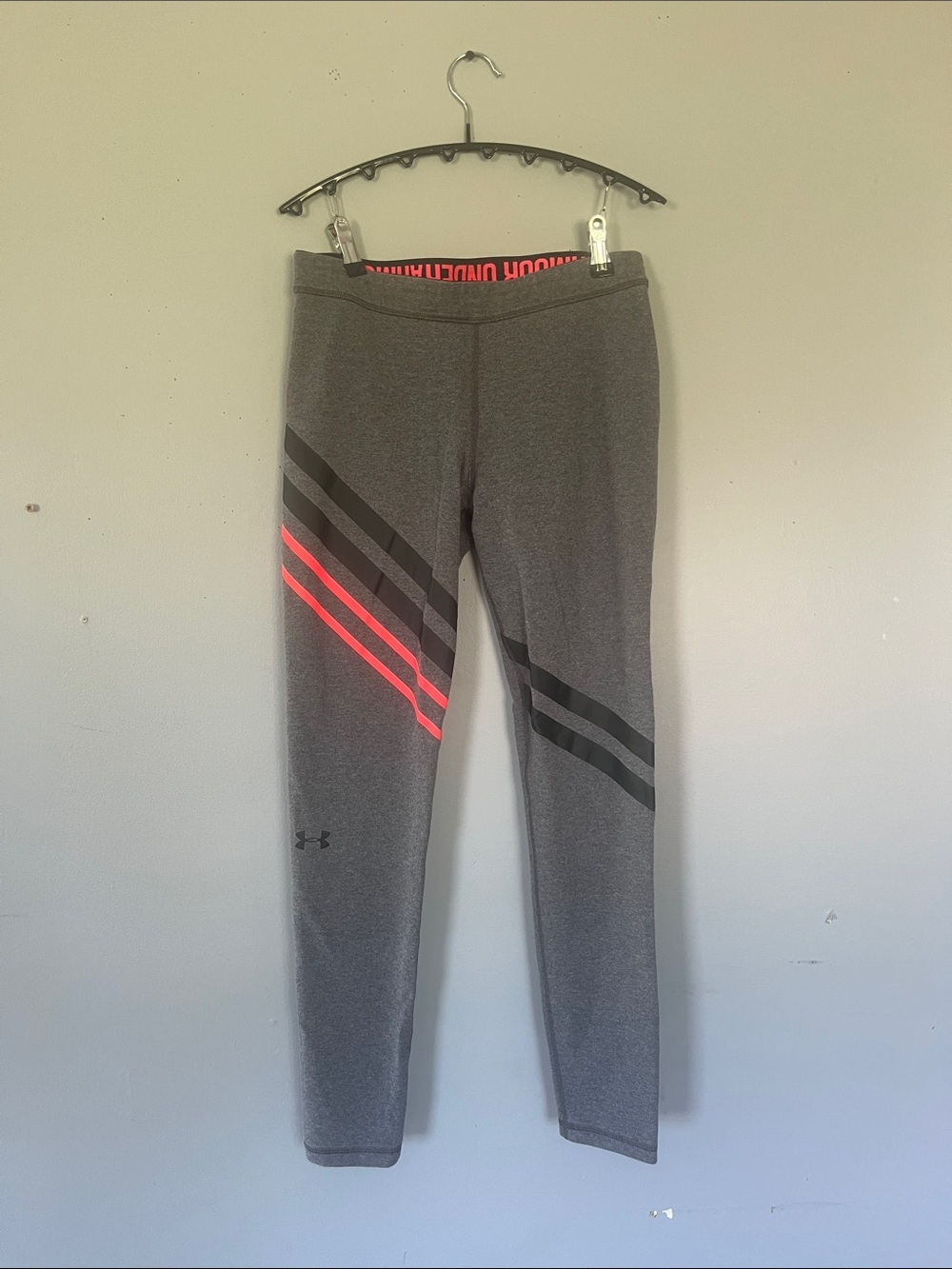 Woman’s Under Armour Gray Leggings with Neon Pink,Black Stripe Accents Medium